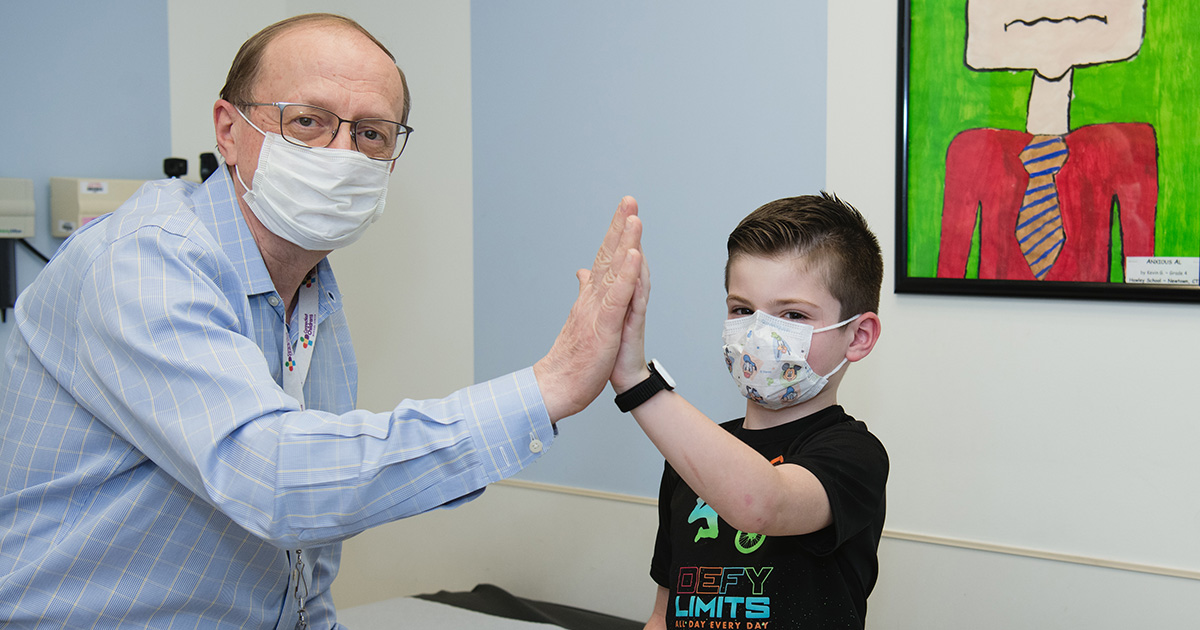 Jacob with Connecticut Children’s Dr. Acsadi.