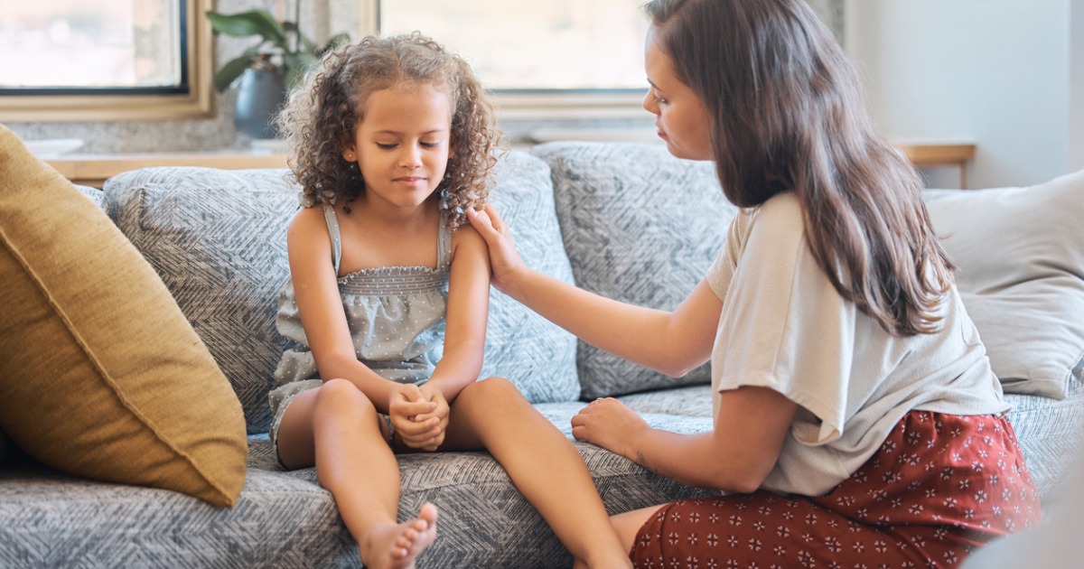 A mother talks to her daughter