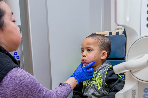 nurse examining patient