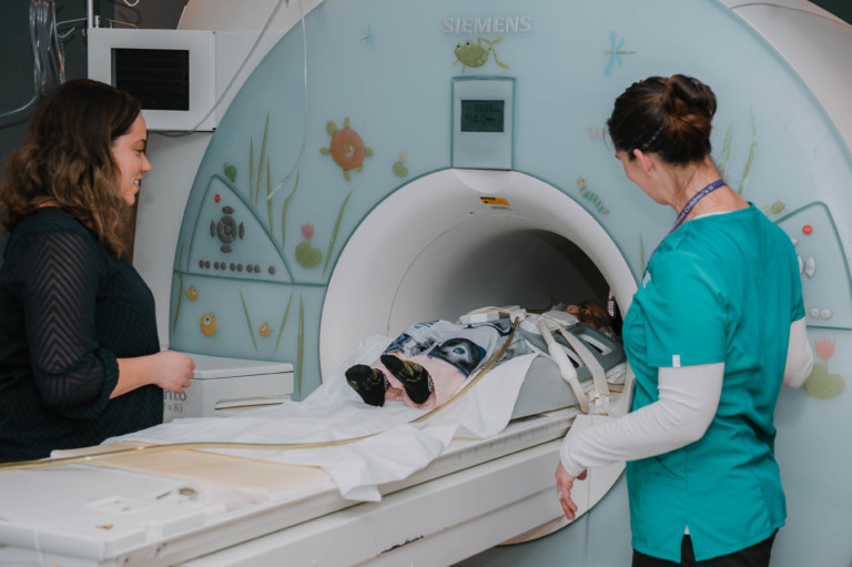 Patient lying down inside MRI machine