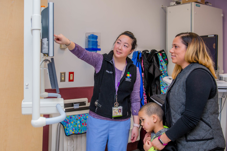 nurse showing patient movie