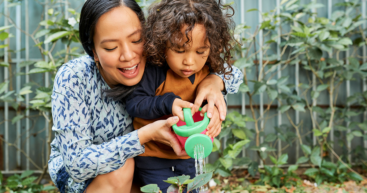 Mother and her child gardening