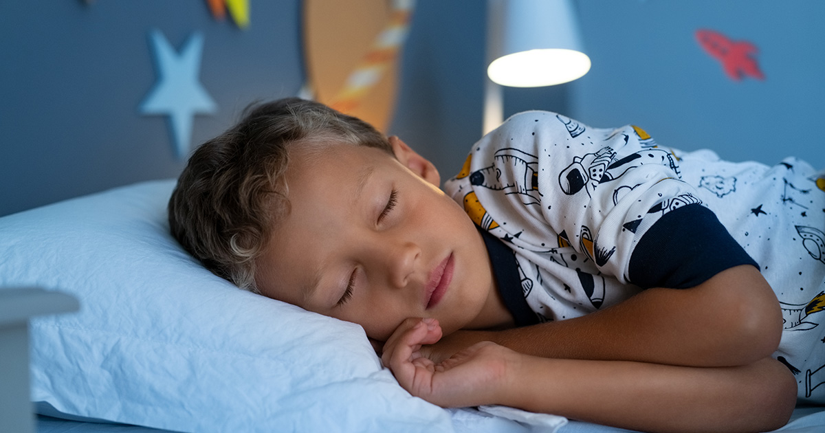 A young boy sleeping