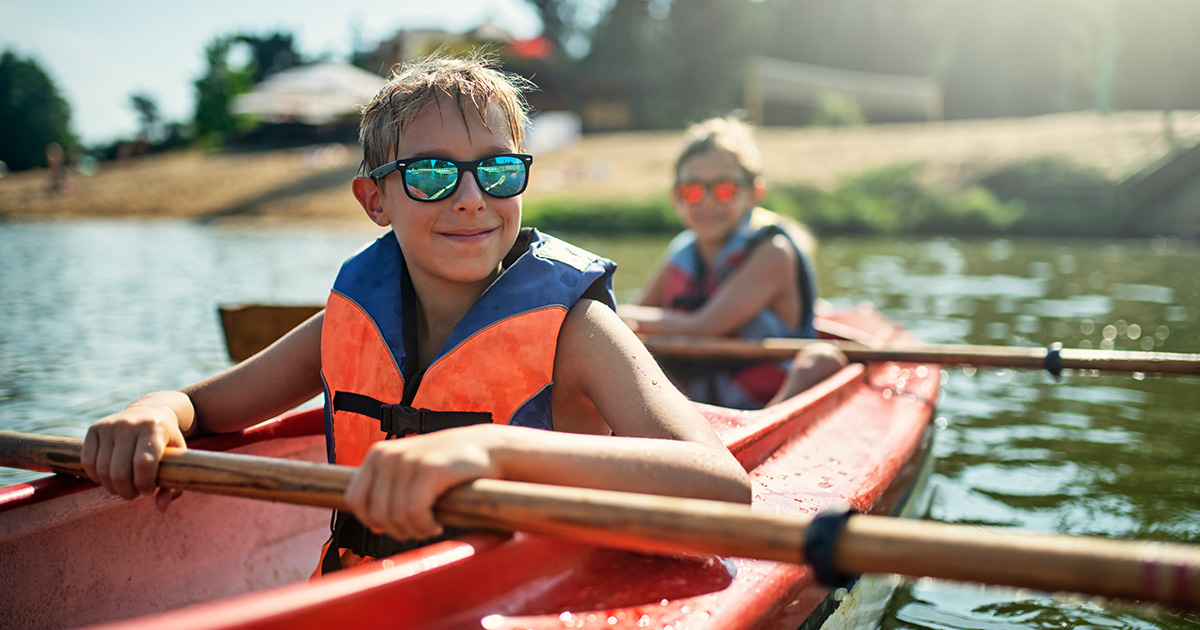 A young boy in a rowboat