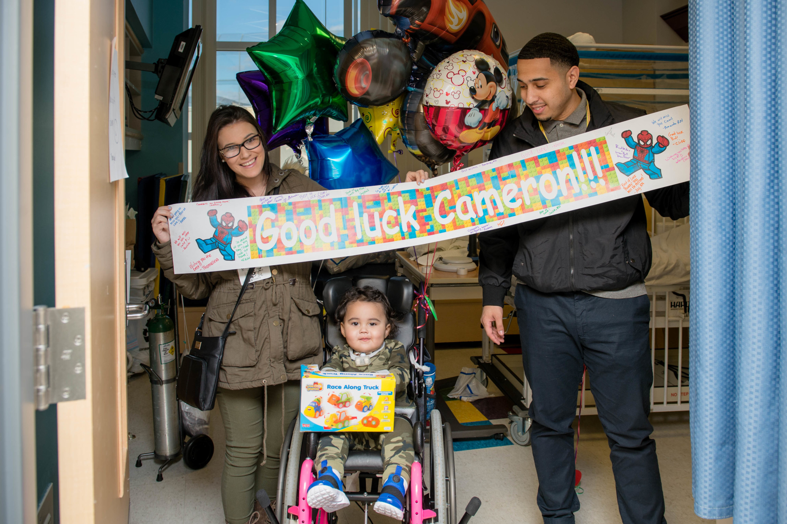 Cameron with his parents