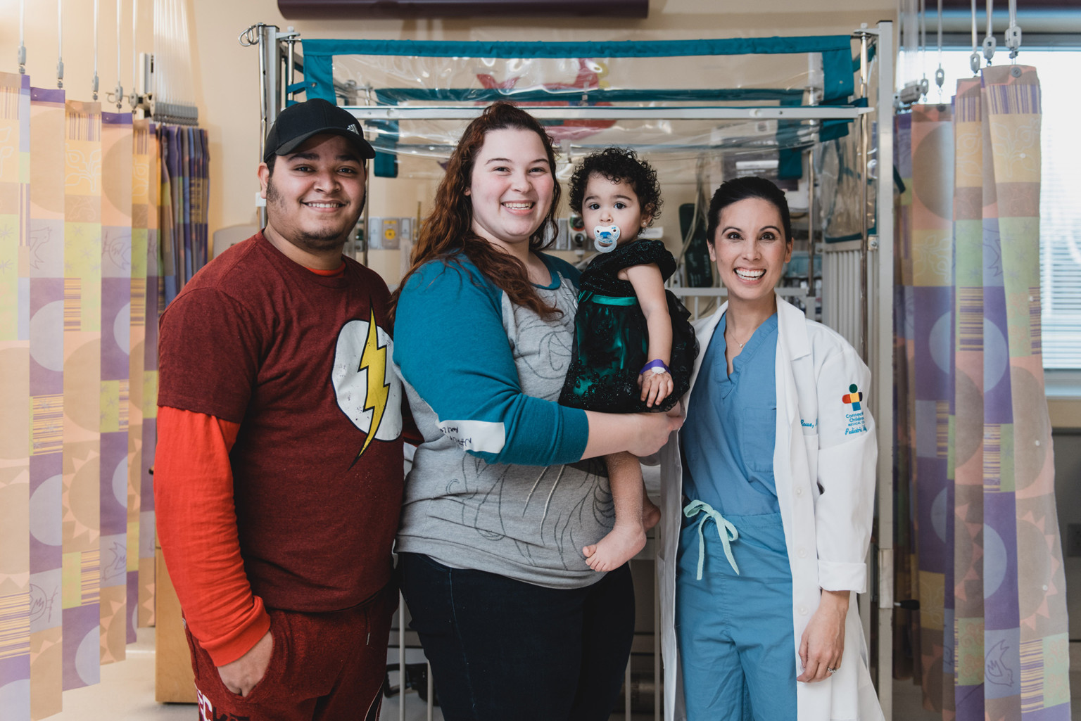 Natalia with her parents and doctor