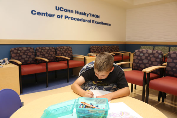 child waiting in patient room