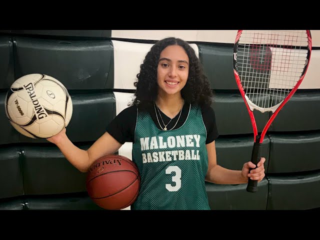 Haley holding a soccer ball, basketball and tennis racket