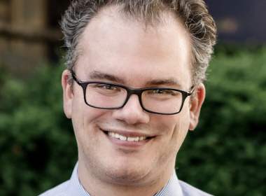 Headshot of Gregory L. Wrubel, MD, a neuroradiologist 