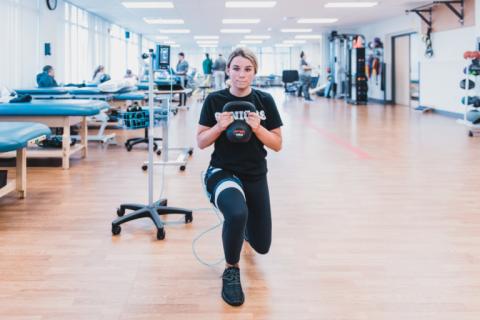 Woman completing a physical therapy workout