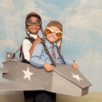 2 boys dressed as pilots in a play