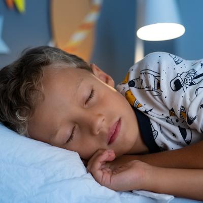 A young boy sleeping