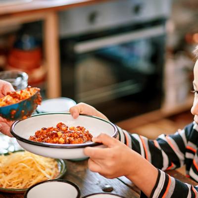 A child accepting a bowl of food