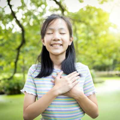 young girl practicing mindfulness