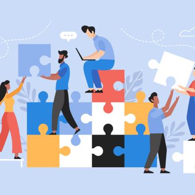 Vector art of people building a puzzle together.